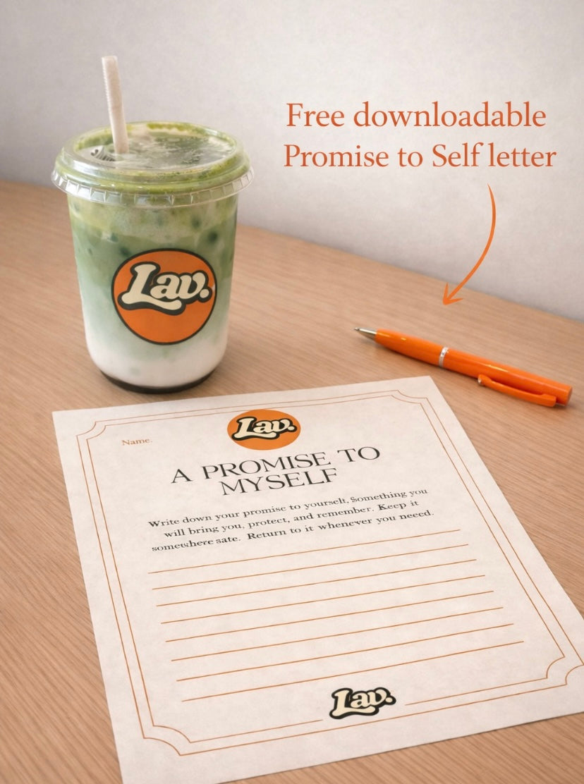 Lav Vintage Promise to Self letter worksheet on a table with pen and branded iced drink, promoting a free downloadable letter.